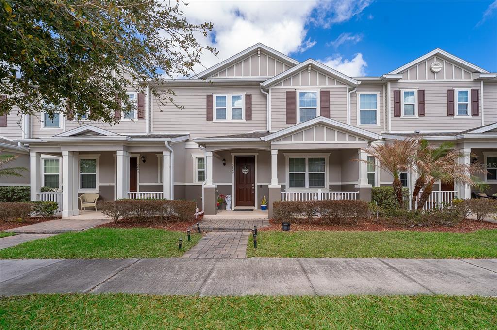 5849 Soter Lane Windermere, FL 34786 - Photo 2 of 31 a front view of a house with a yard