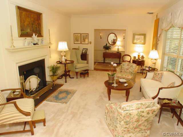 10 Robin Road Richmond, VA 23226 - Photo 2 of 10 a living room with couches chairs and a fireplace