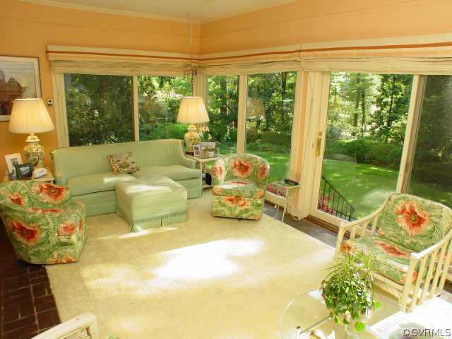 10 Robin Road Richmond, VA 23226 - Photo 4 of 10 a living room with patio furniture and a floor to ceiling window