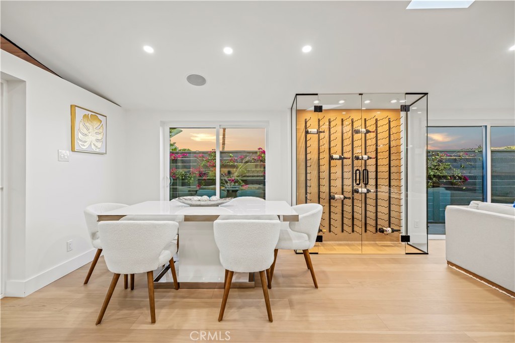 22263 Flanco Road Woodland Hills, CA 91364 - Photo 25 of 69 a view of a dining room with furniture window and outside view
