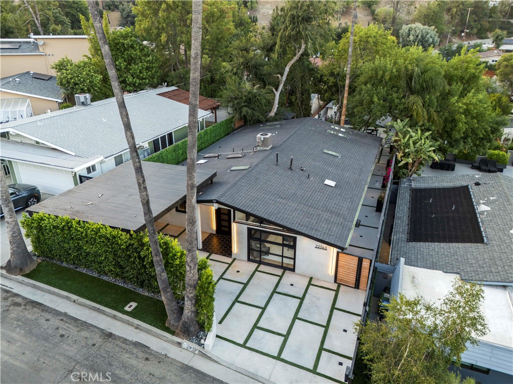22263 Flanco Road Woodland Hills, CA 91364 - Photo 67 of 69 an aerial view of a house with a yard