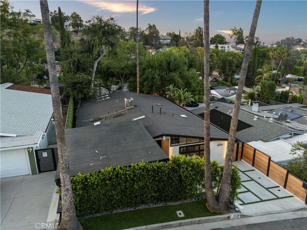 22263 Flanco Road Woodland Hills, CA 91364 - Photo 69 of 69 an aerial view of a house with a yard