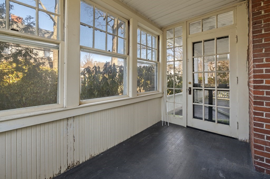97 Beach Bluff Avenue Swampscott, MA 01907 - Photo 12 of 36 a view of an empty room with a window