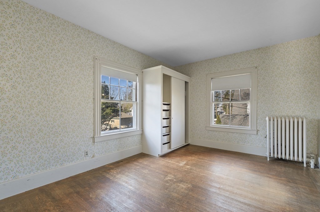 97 Beach Bluff Avenue Swampscott, MA 01907 - Photo 27 of 36 an empty room with windows