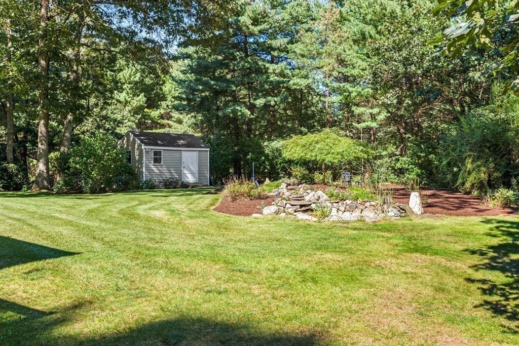 27 Lewis Road Foxboro, MA 02035 - Photo 35 of 40 a view of a house with a yard