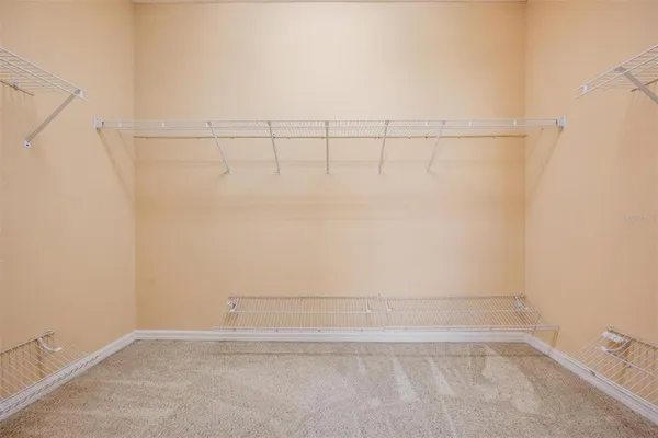 a white bath tub sitting next to a white sink
