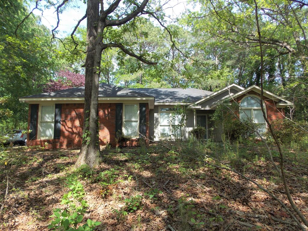562 Evergreen Drive Fortson, GA 31808 - Photo 1 of 9 a front view of a house with a yard