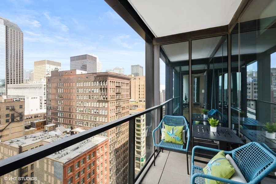 60 East Monroe Street, Unit 2005 Chicago, IL 60603 - Photo 9 of 13 a view of balcony with couch