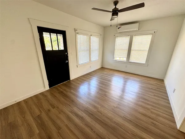 a living room with a couch and a table