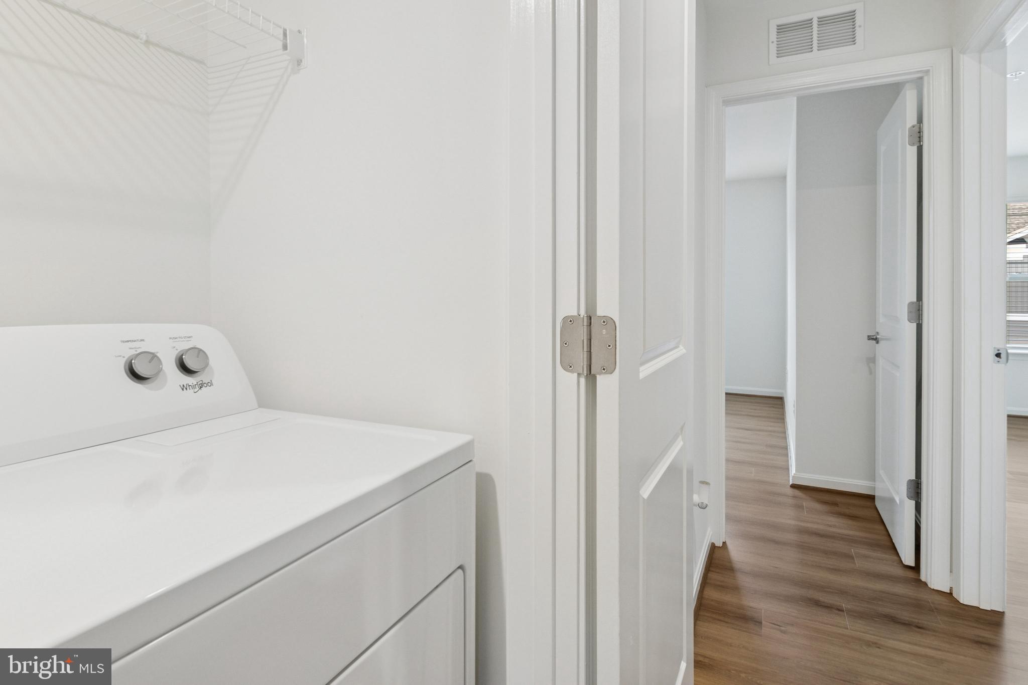 7811 Wolf Run Lane Severn, MD 21144 - Photo 19 of 32 a utility room with dryer and washer