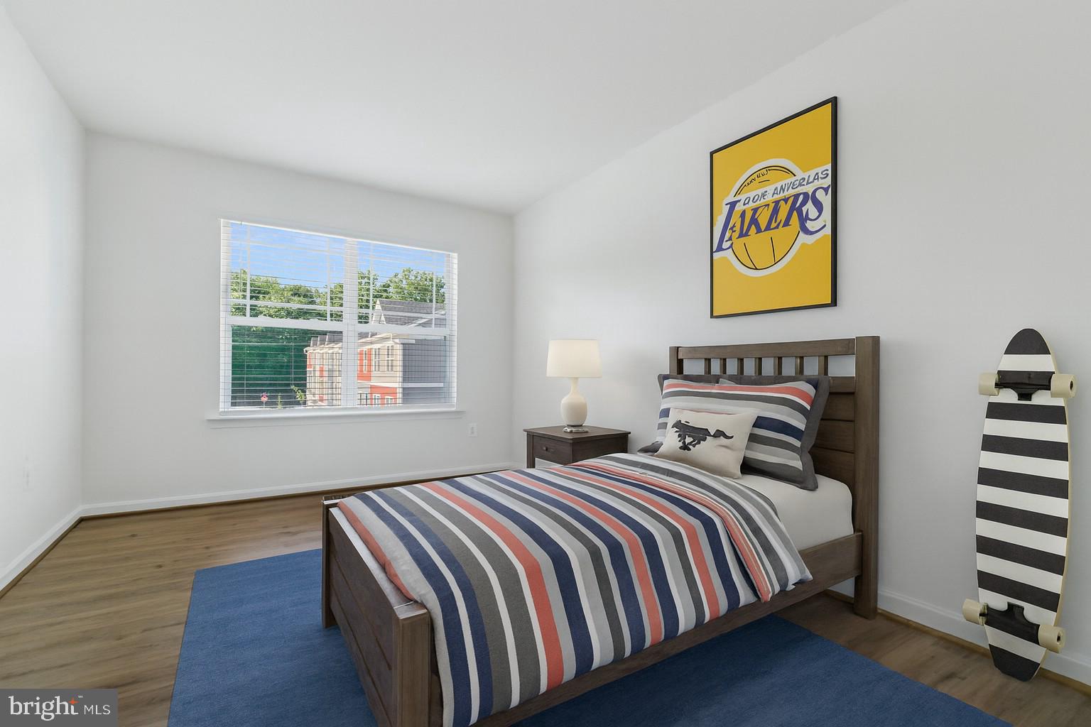 7811 Wolf Run Lane Severn, MD 21144 - Photo 20 of 32 a bedroom with bed and a window