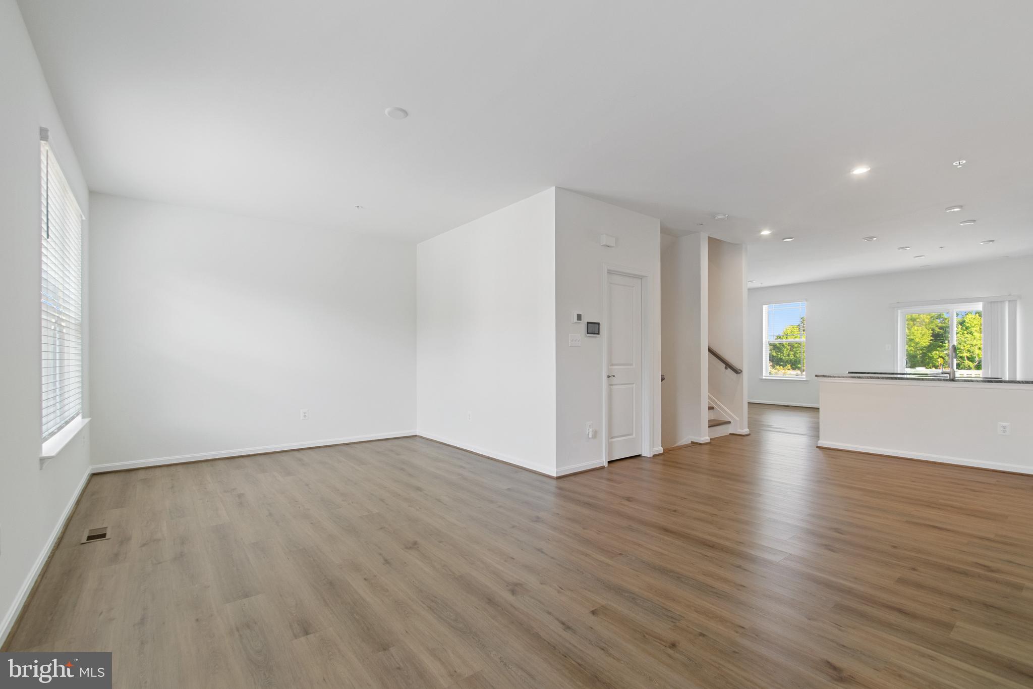 7811 Wolf Run Lane Severn, MD 21144 - Photo 7 of 32 a view of a livingroom with wooden floor