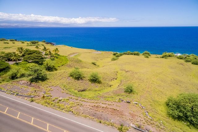 a view of a swimming pool and an outdoor space