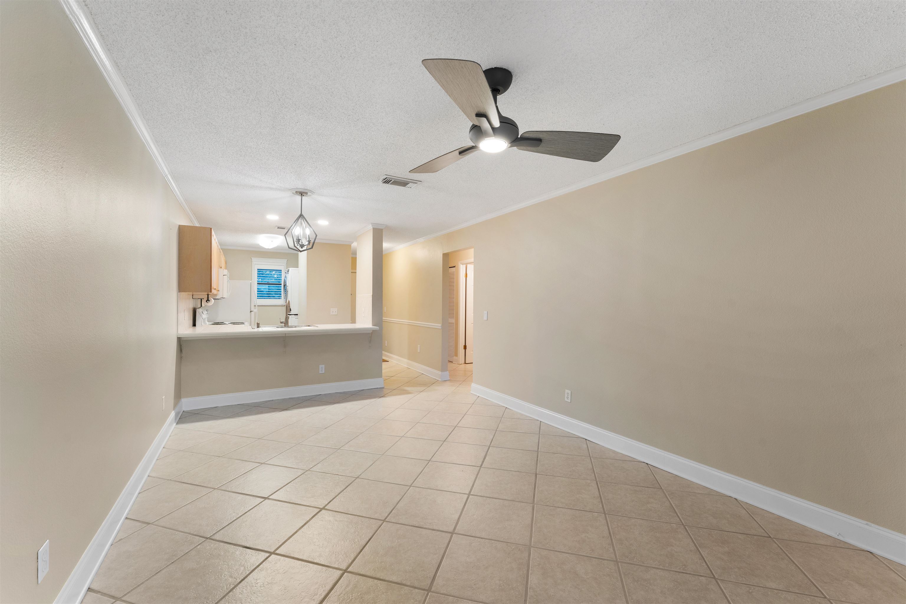 650 West Pope Road, Unit 233 St. Augustine, FL 32080 - Photo 11 of 31 a view of a kitchen with a sink and a window