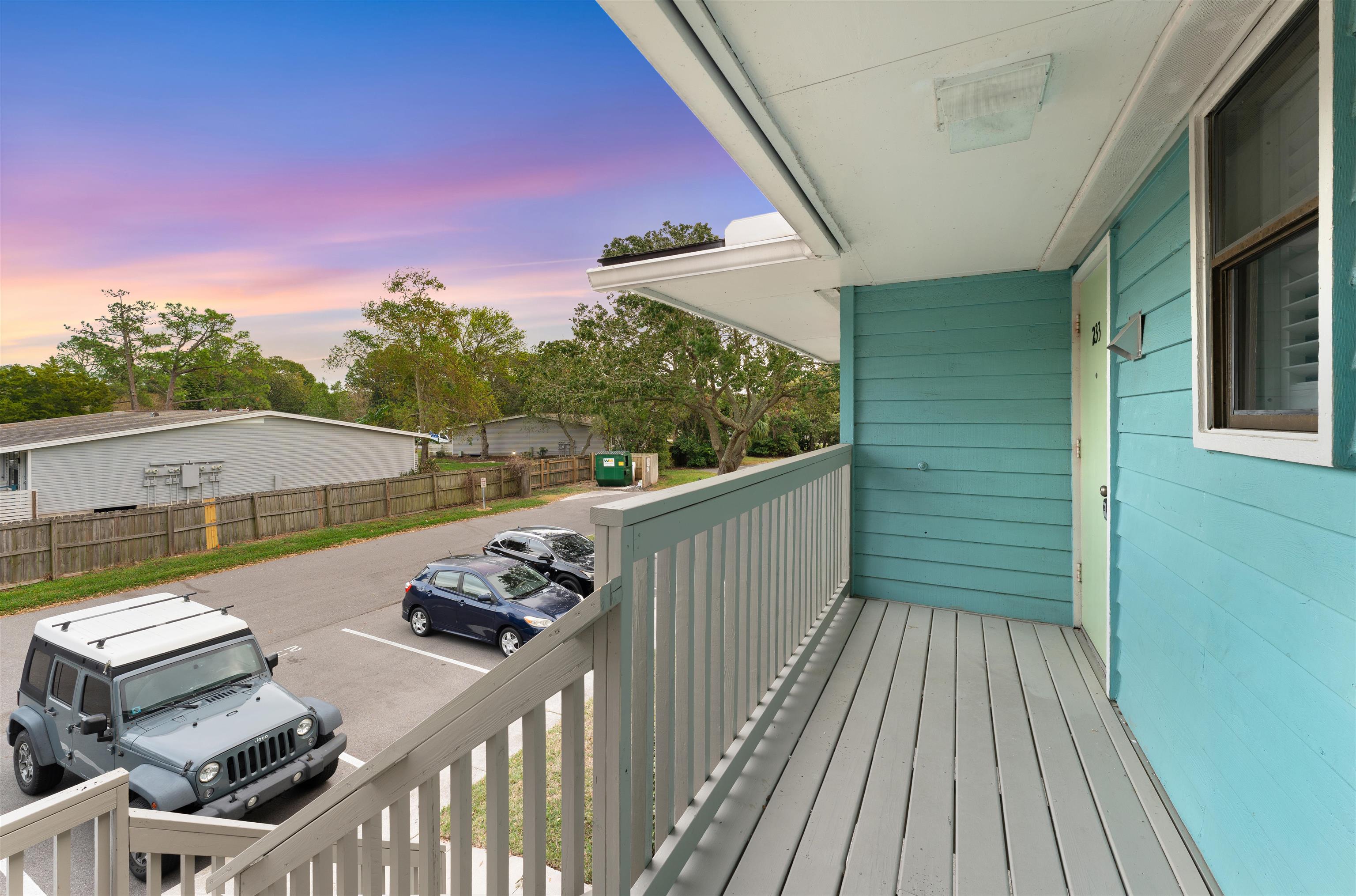 650 West Pope Road, Unit 233 St. Augustine, FL 32080 - Photo 4 of 31 a view of a balcony with chairs