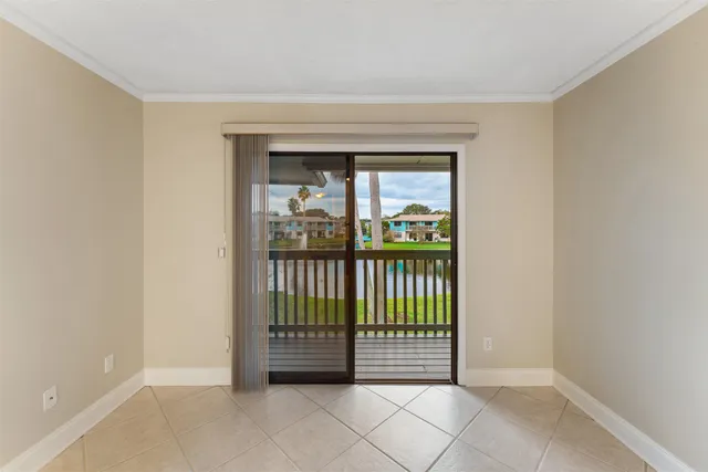 a view of a room with a large window