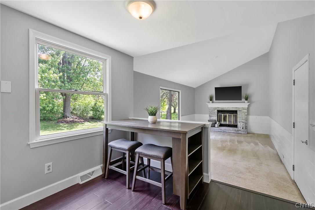 8841 Wandering Way Lysander, NY 13027 - Photo 18 of 42 Vaulted ceiling in family room creates an open airy feel.