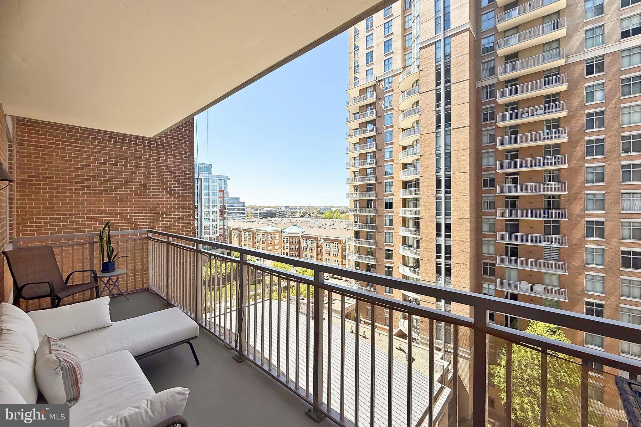 11990 Market Street, Unit 908 Reston, VA 20190 - Photo 22 of 45 a view of balcony with couch