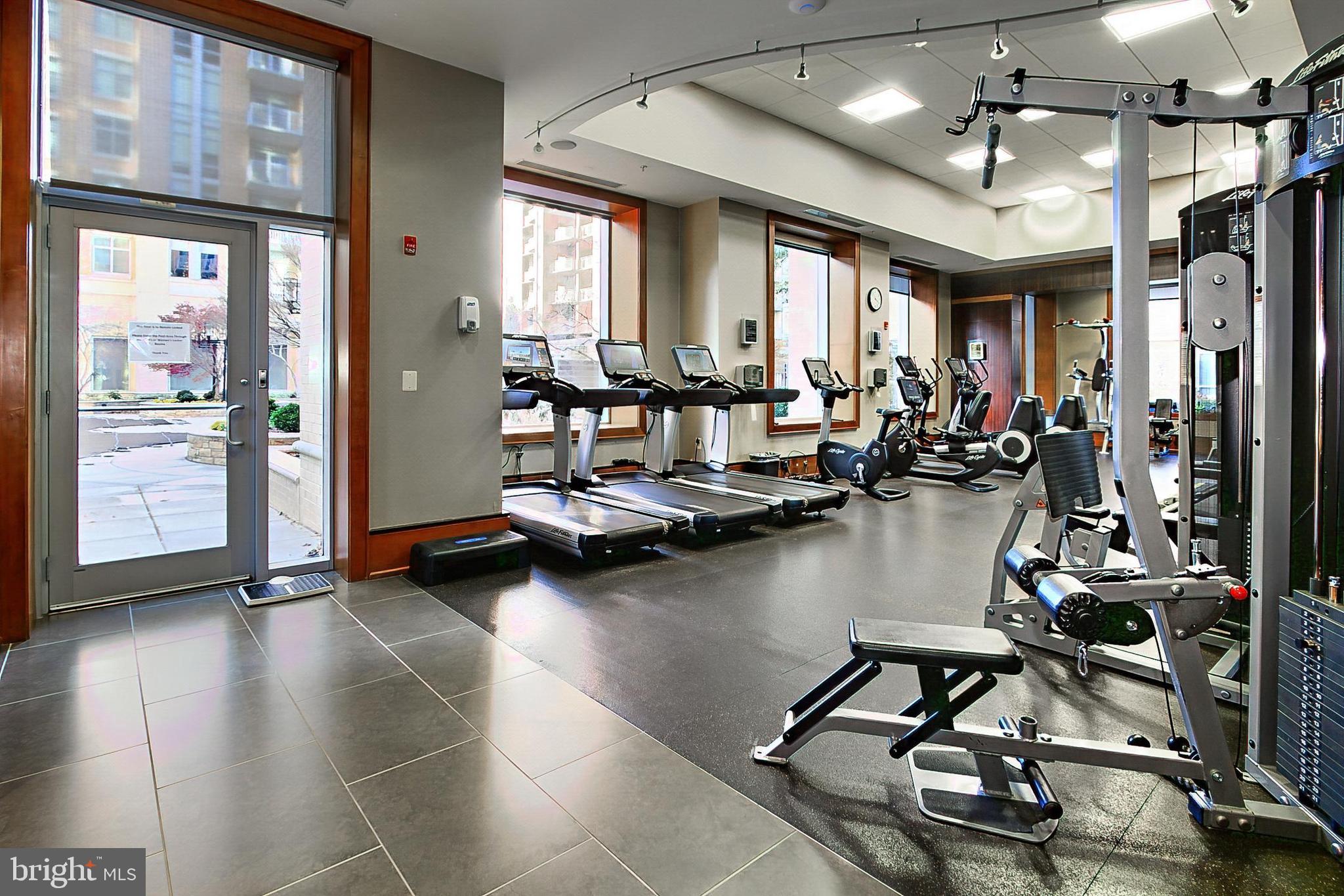11990 Market Street, Unit 908 Reston, VA 20190 - Photo 29 of 45 a view of a room with gym equipment