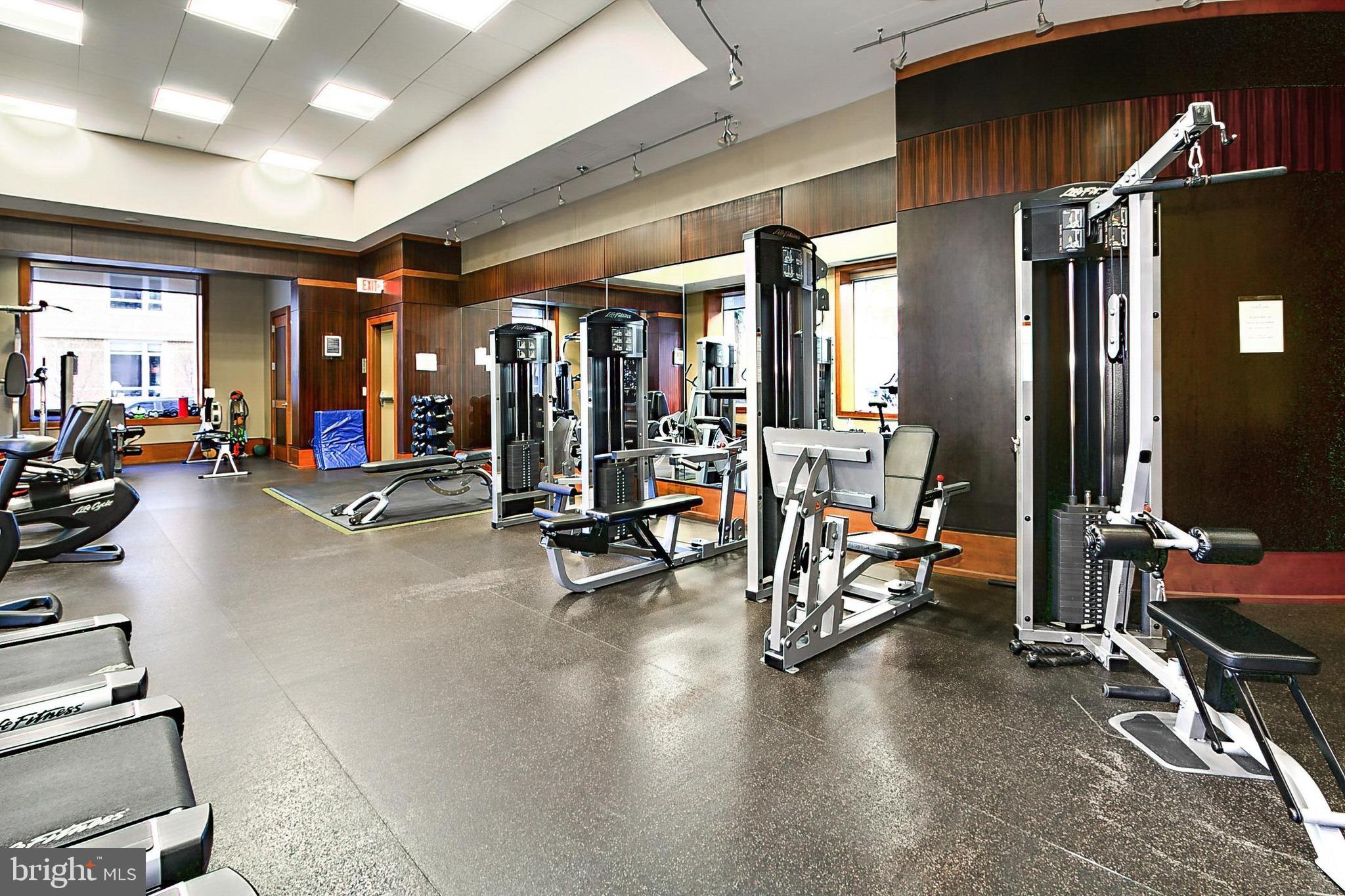 11990 Market Street, Unit 908 Reston, VA 20190 - Photo 30 of 45 a view of a room with gym equipment