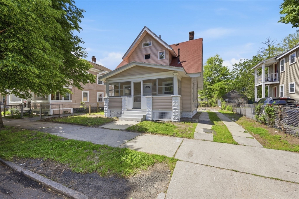 62 Kenyon Street Springfield, MA 01109 - Photo 3 of 26 a front view of a house with garden