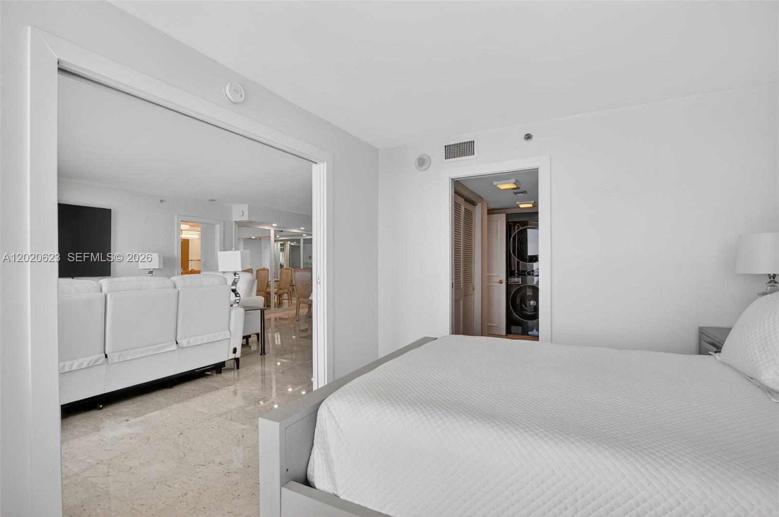 4101 North Ocean Boulevard, Unit 1605 Boca Raton, FL 33431 - Photo 16 of 35 a bedroom with a bed and a view living room