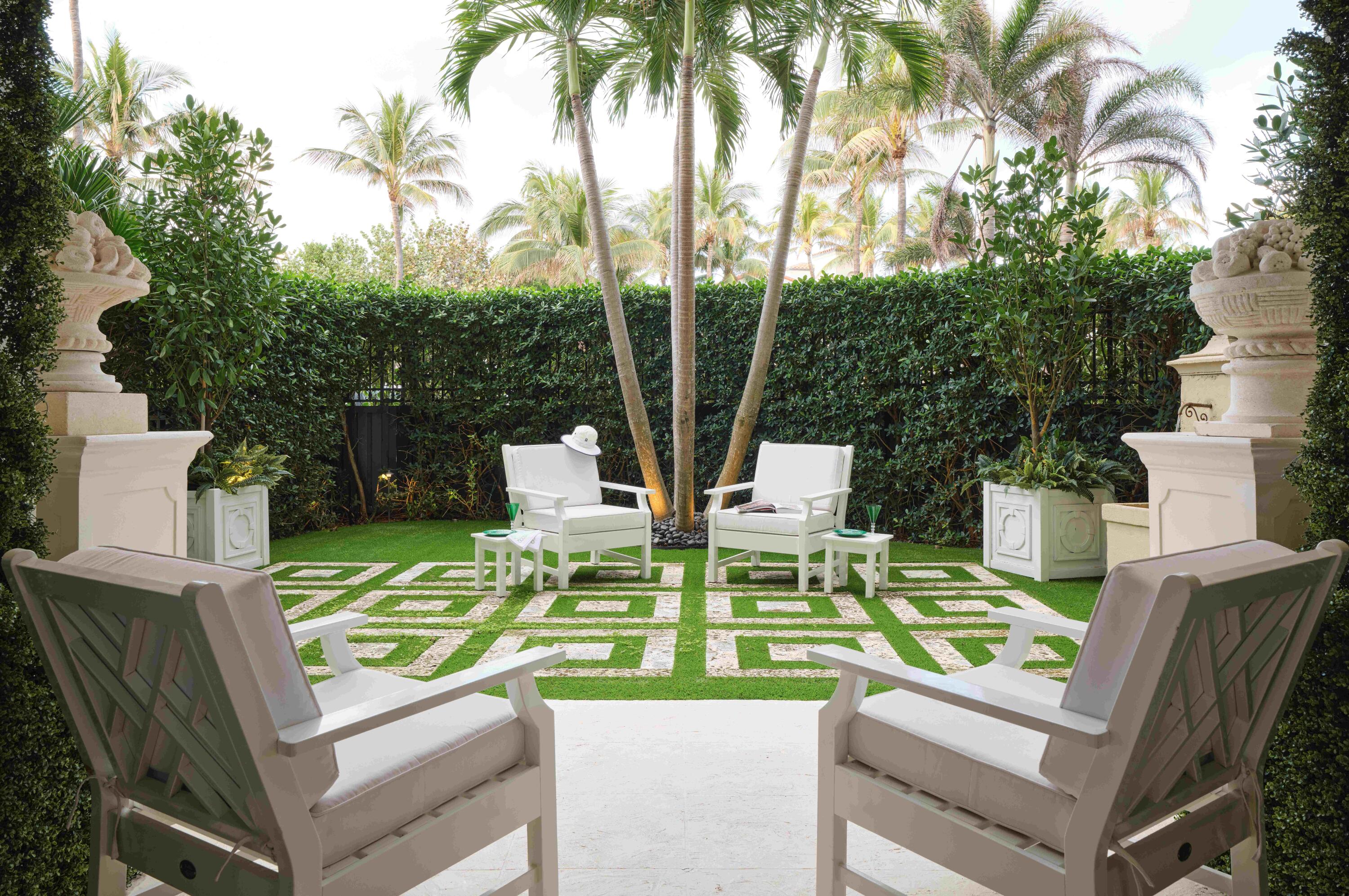 100 Royal Palm Way, Unit F1 Palm Beach, FL 33480 - Photo 2 of 43 a view of a patio with swimming pool