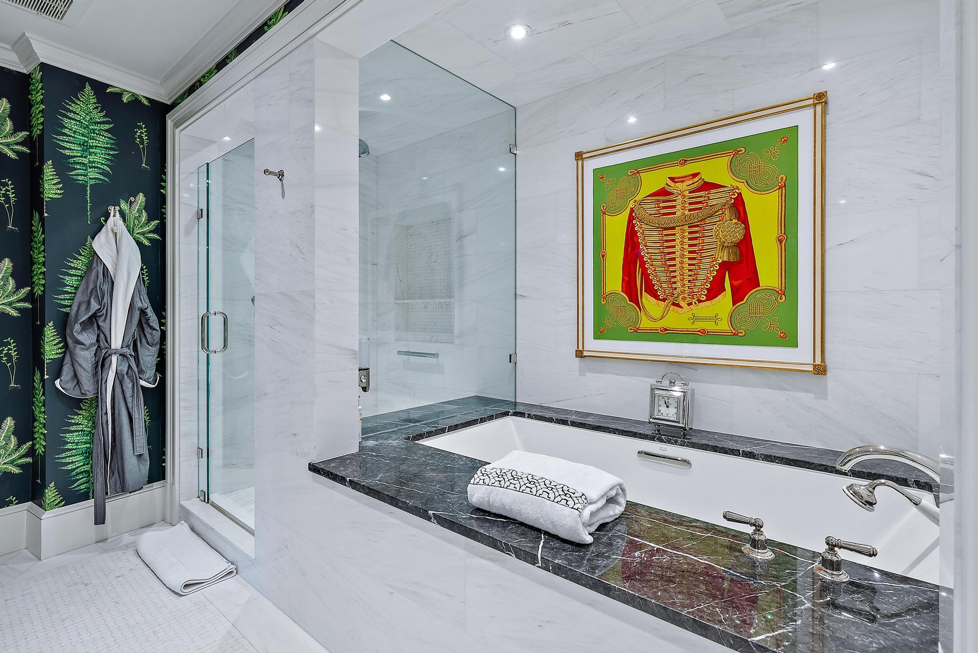 100 Royal Palm Way, Unit F1 Palm Beach, FL 33480 - Photo 26 of 43 a bathroom with a tub sink and mirror