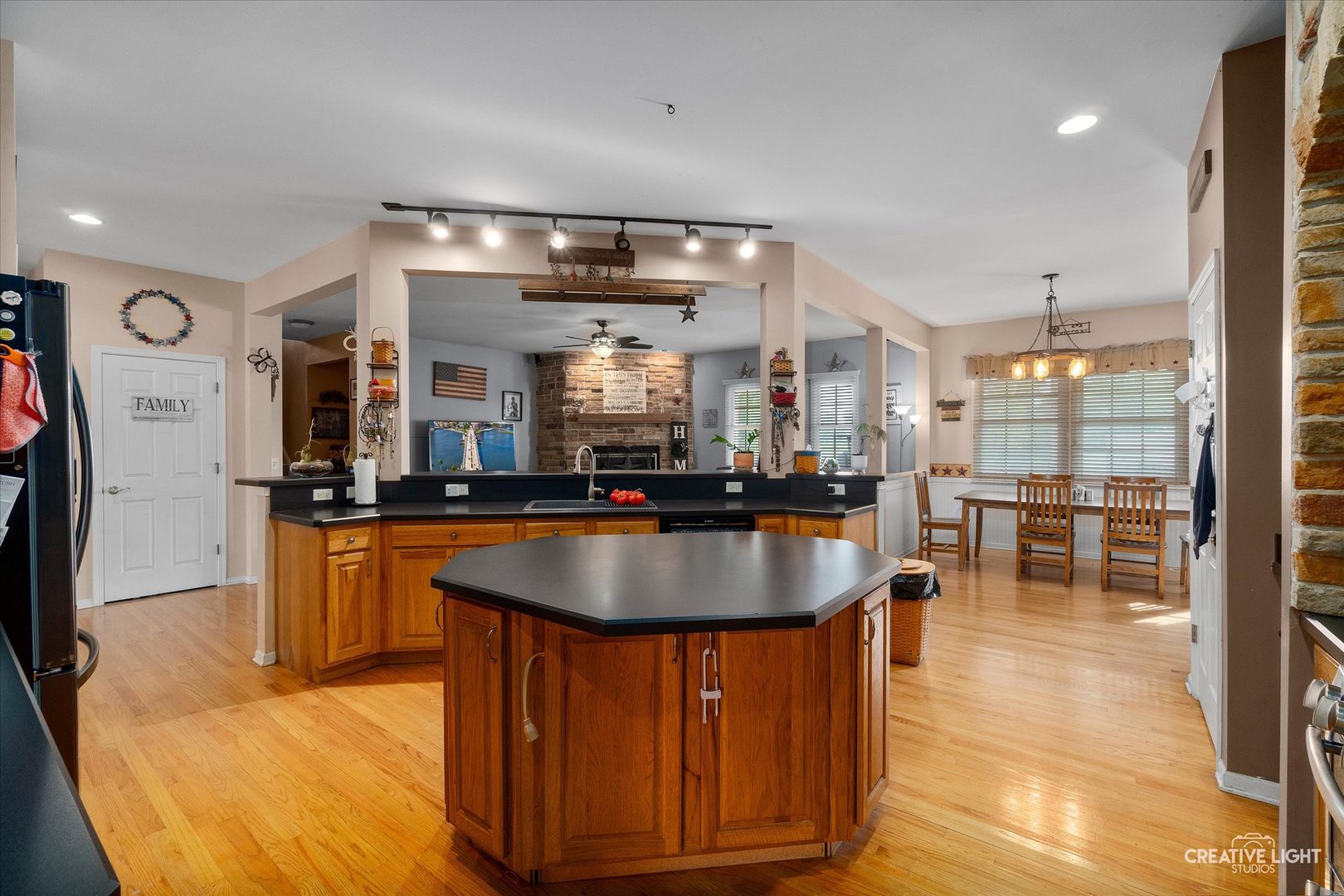 1750 Little Rock Road Plano, IL 60545 - Photo 12 of 33 a dining table with chairs and chandelier