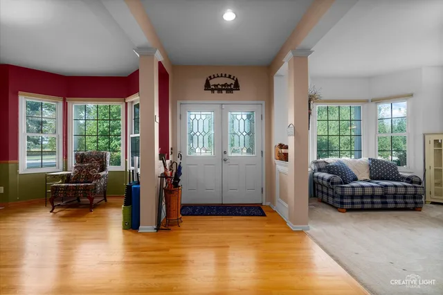 a living room with furniture and windows