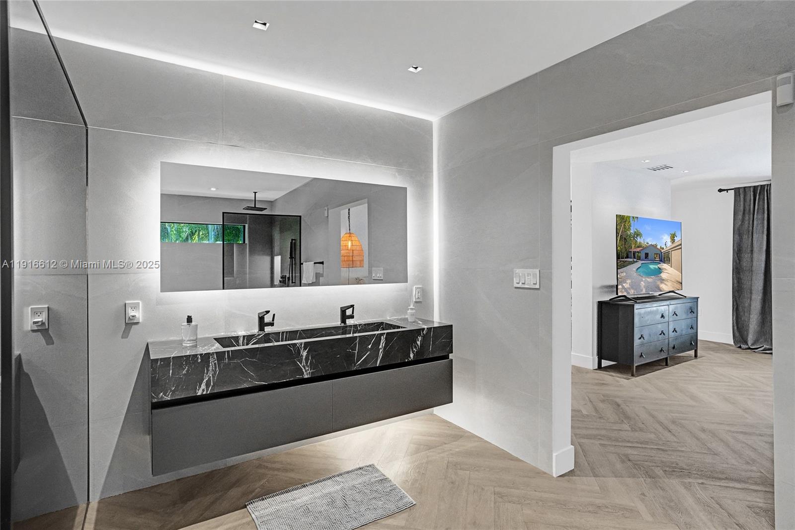 14135 North Miami Avenue Miami, FL 33168 - Photo 14 of 32 a spacious bathroom with a tub double vanity and a mirror