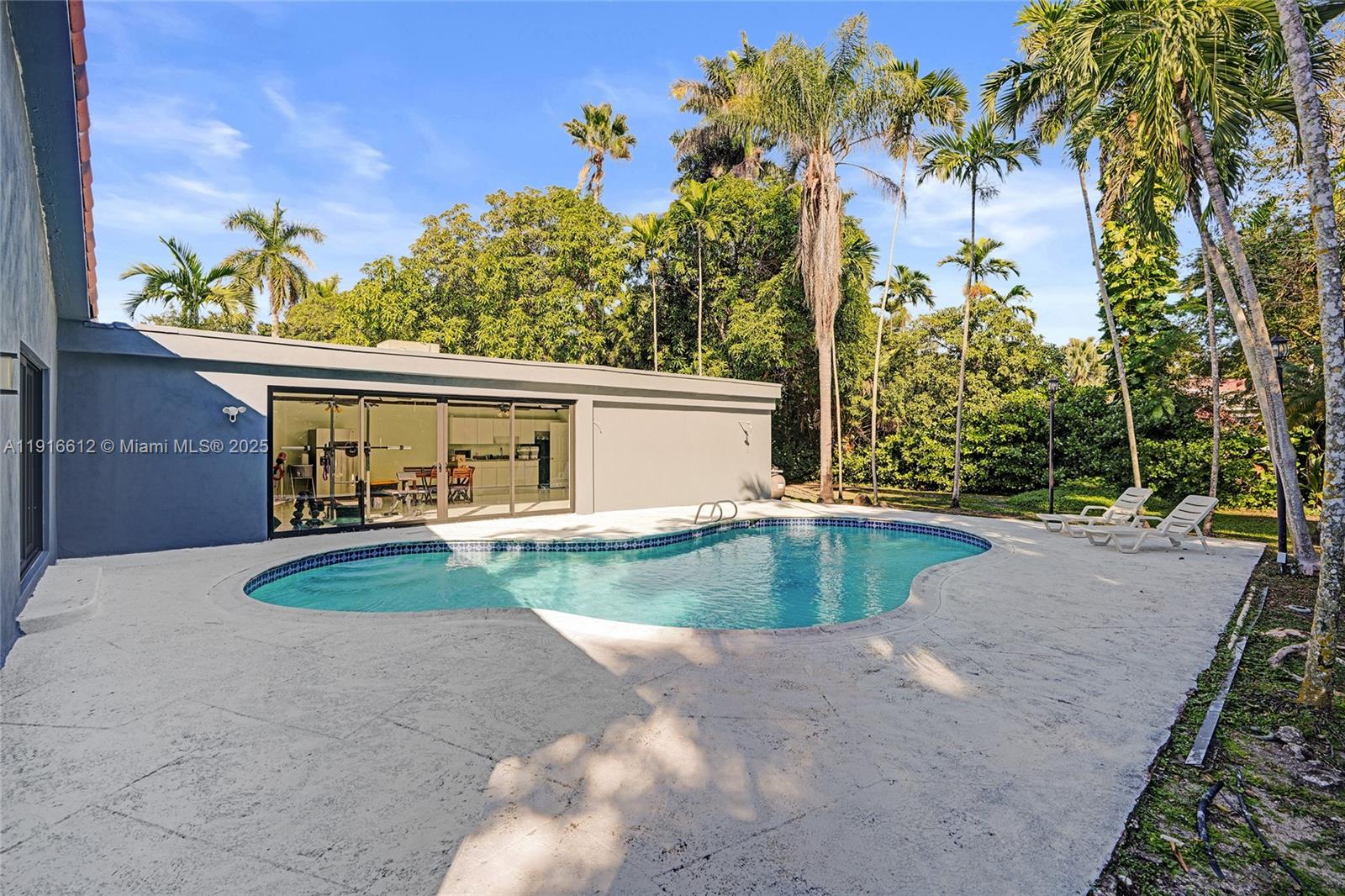 14135 North Miami Avenue Miami, FL 33168 - Photo 28 of 32 a view of a house with backyard and garden
