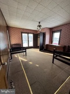 a lobby with furniture and windows