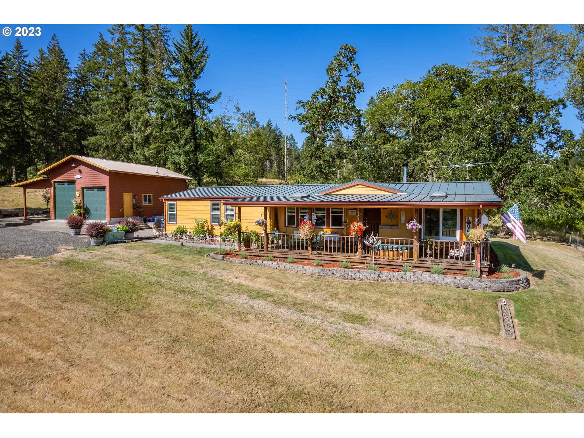 28485 Briggs Hill Road Eugene, OR 97405 - Photo 1 of 36 a view of a house with swimming pool and sitting area