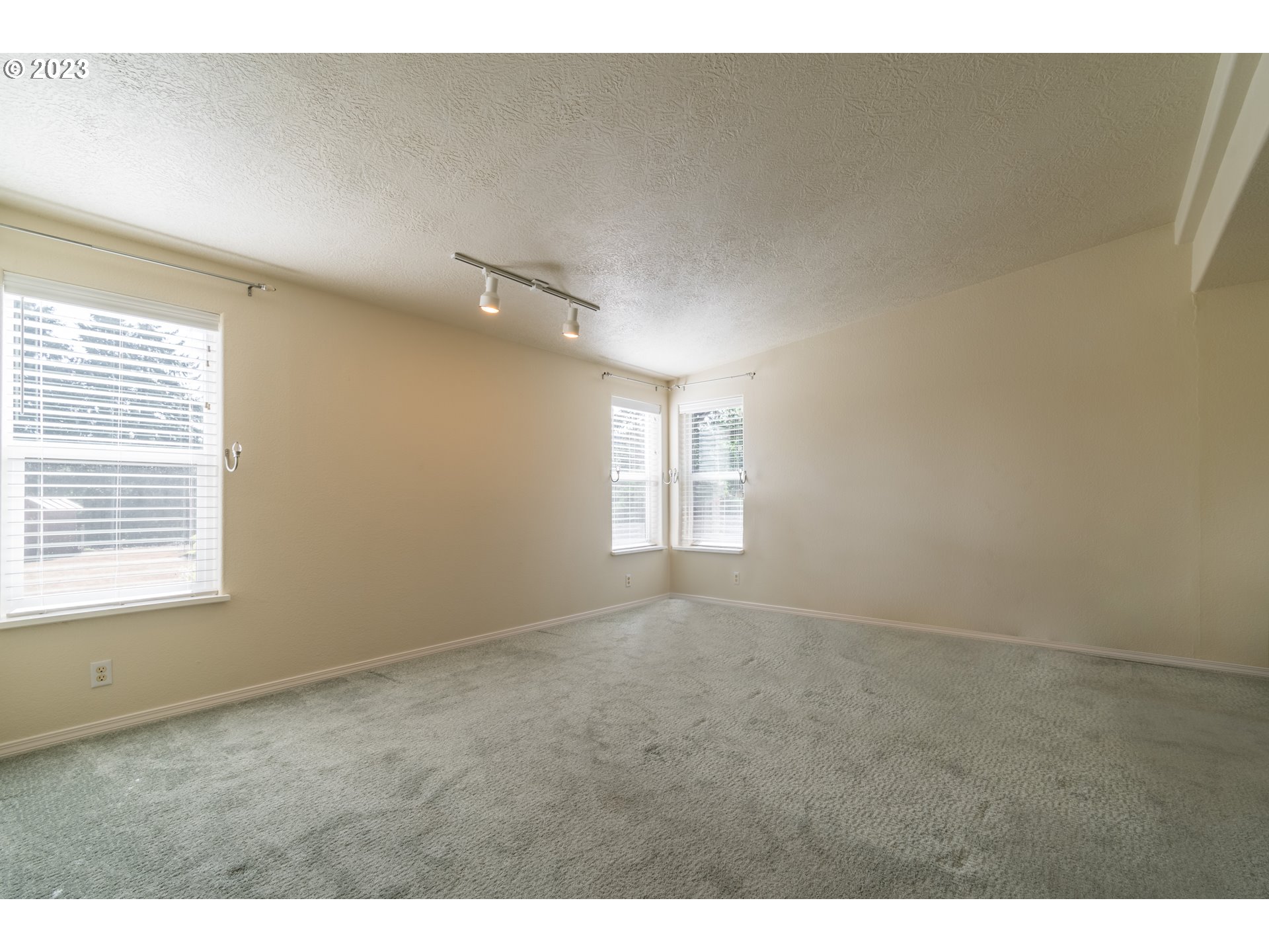 28485 Briggs Hill Road Eugene, OR 97405 - Photo 13 of 36 a view of an empty room with a window