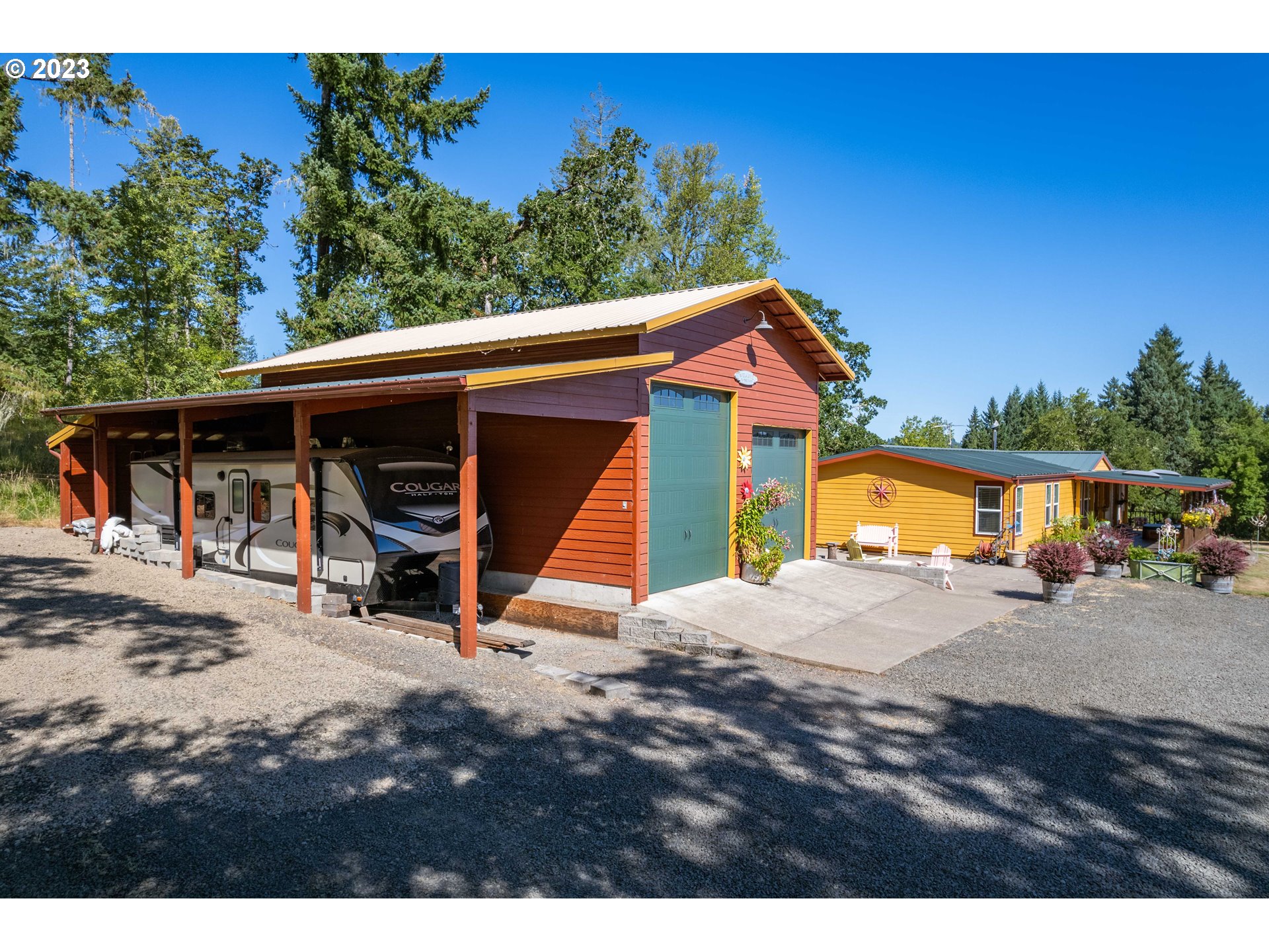 28485 Briggs Hill Road Eugene, OR 97405 - Photo 25 of 36 a view of a house with backyard and sitting area