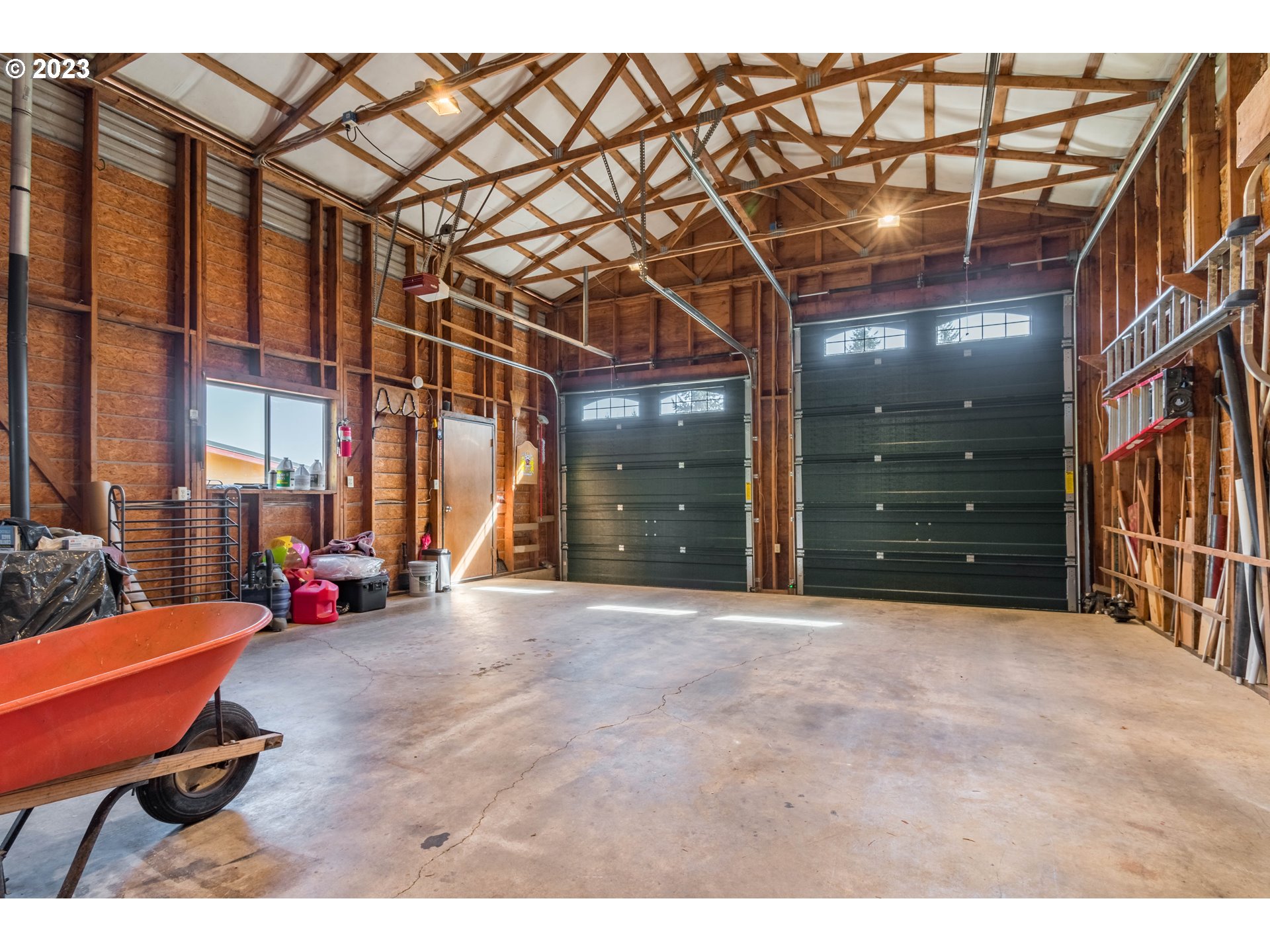 28485 Briggs Hill Road Eugene, OR 97405 - Photo 28 of 36 a view of a room with gym equipment and next to a window