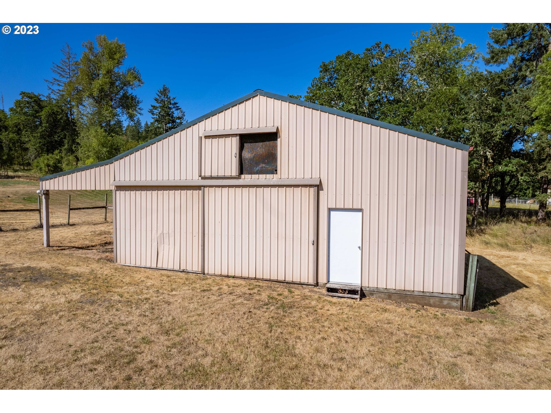 28485 Briggs Hill Road Eugene, OR 97405 - Photo 30 of 36 a house view with a backyard space