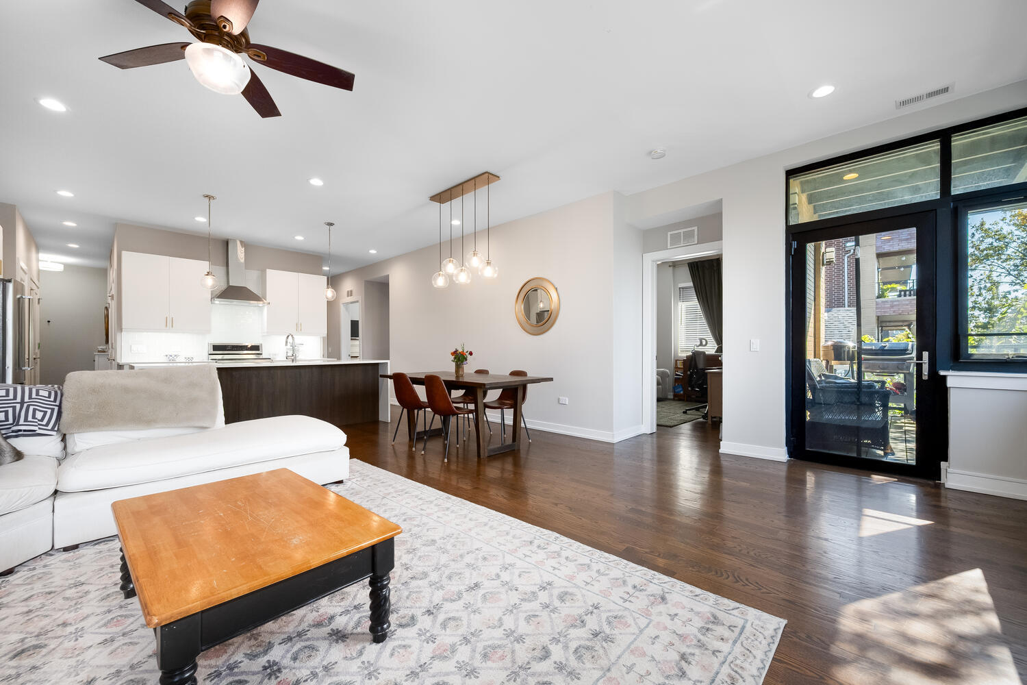 1841 North California Avenue, Unit 3B Chicago, IL 60647 - Photo 12 of 22 a living room with furniture and a large window