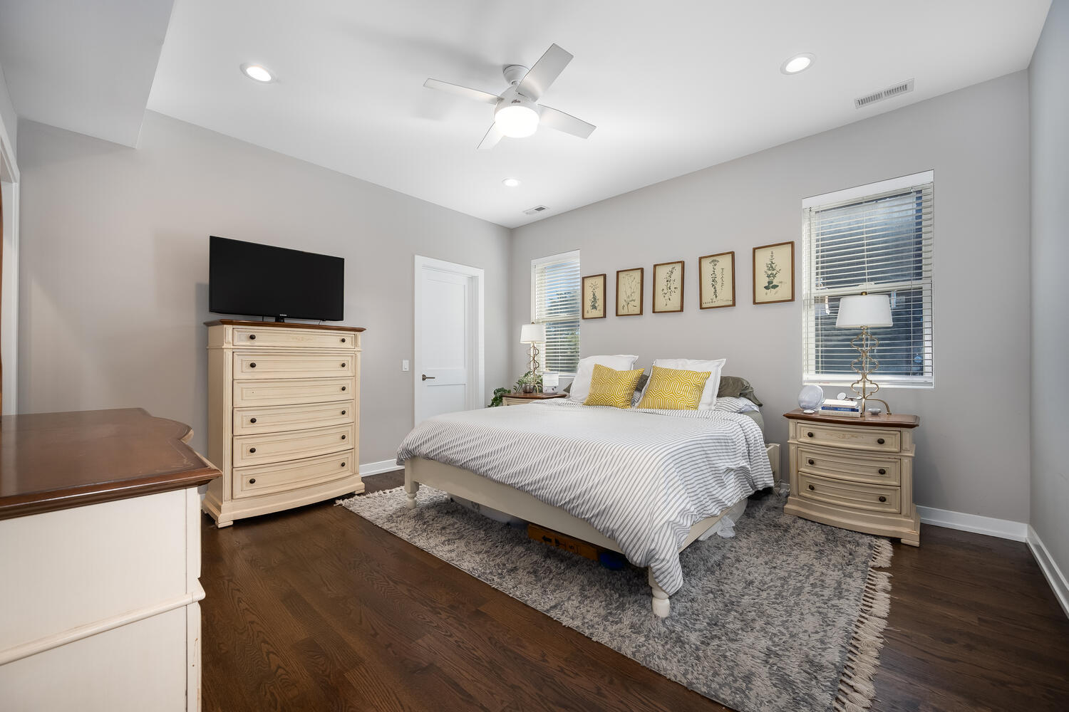 1841 North California Avenue, Unit 3B Chicago, IL 60647 - Photo 14 of 22 a bedroom with a large bed and a tv