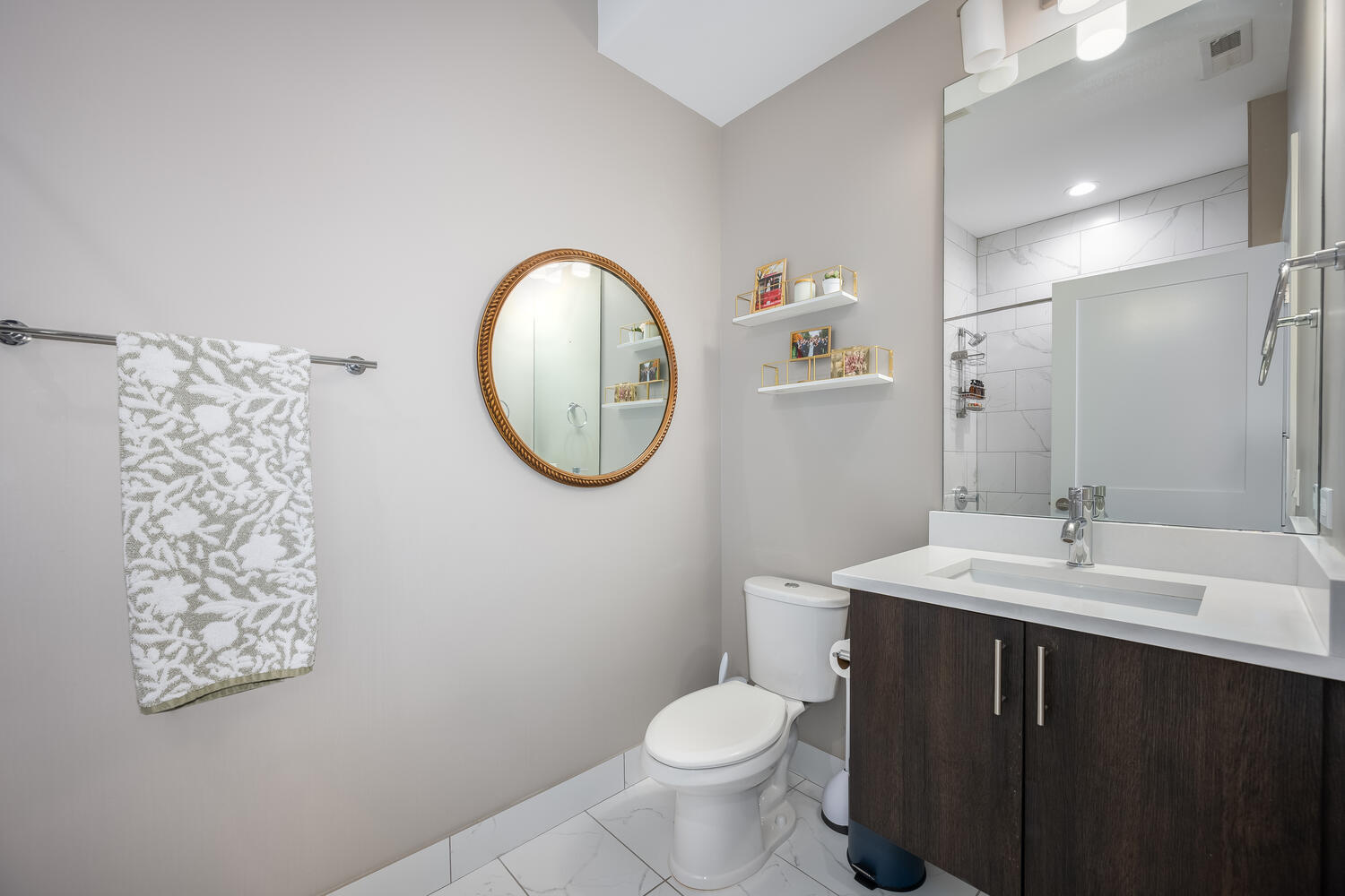 1841 North California Avenue, Unit 3B Chicago, IL 60647 - Photo 17 of 22 a bathroom with a toilet a sink and a mirror