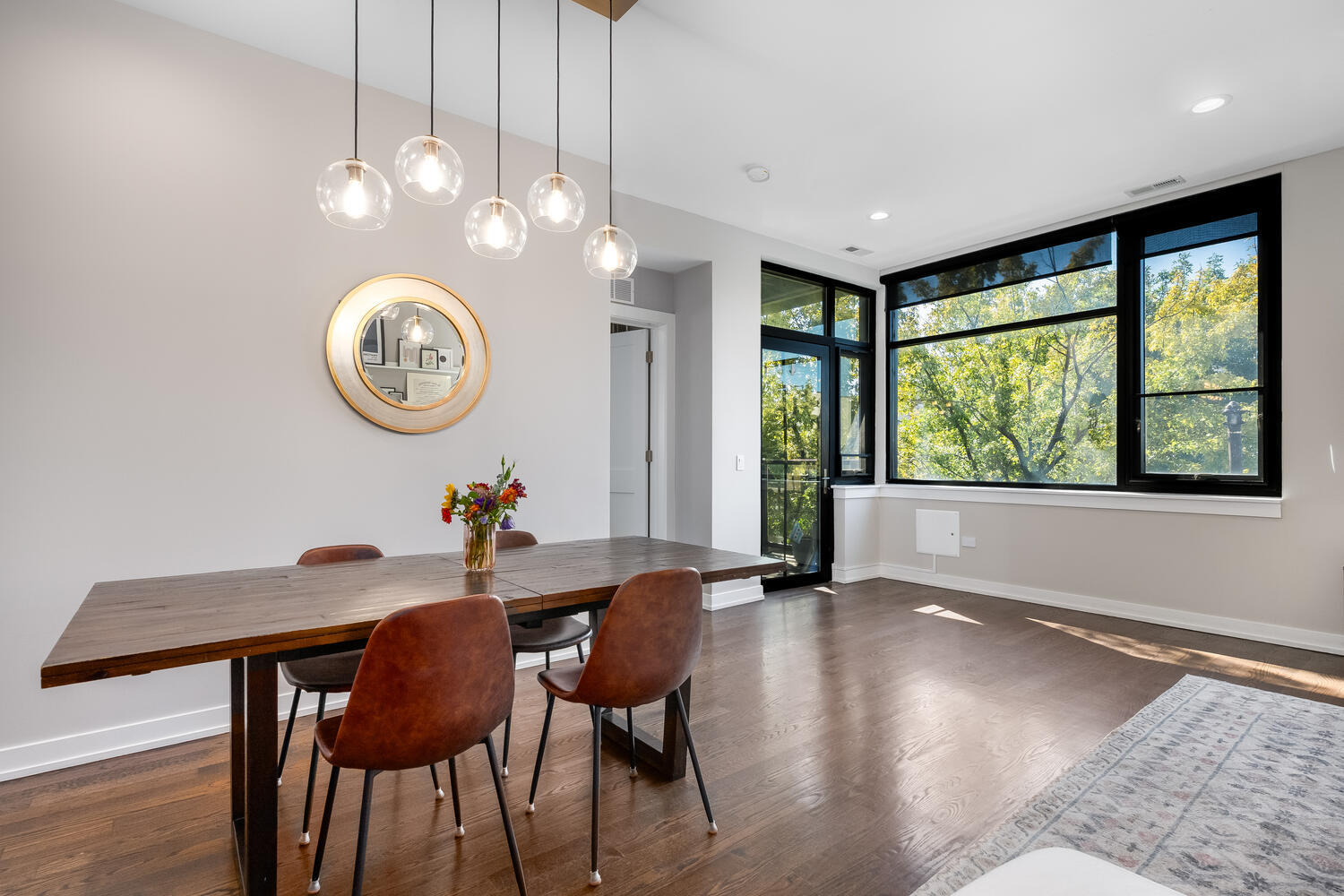 1841 North California Avenue, Unit 3B Chicago, IL 60647 - Photo 10 of 22 a view of a dining room with furniture window and outside view