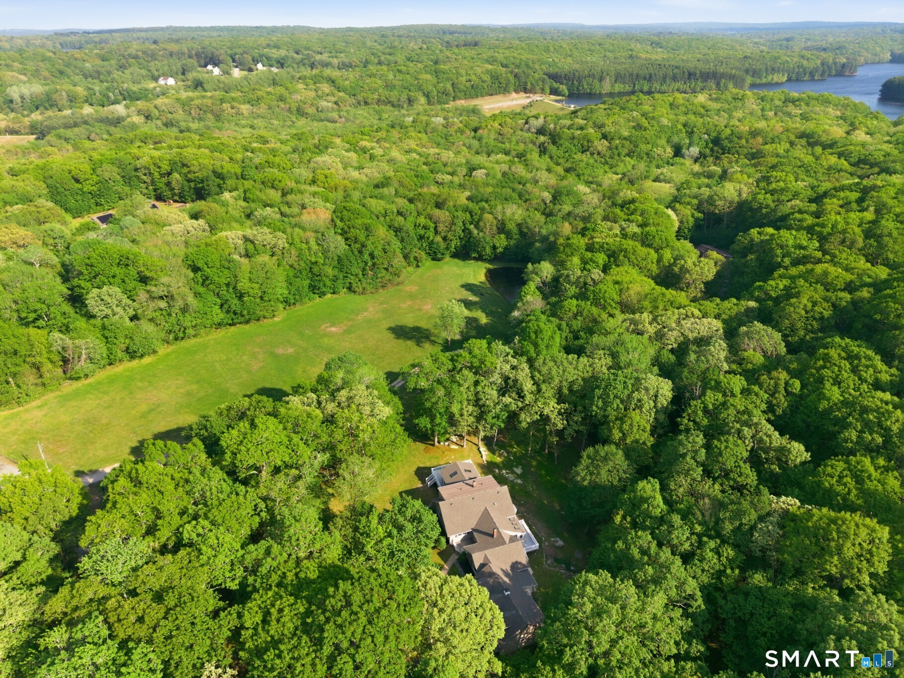 70 Mahoney Road Colchester, CT 06415 - Photo 40 of 40 an aerial view of residential houses with outdoor space and trees