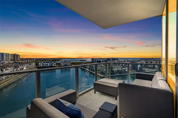 a view of a terrace with a lake view