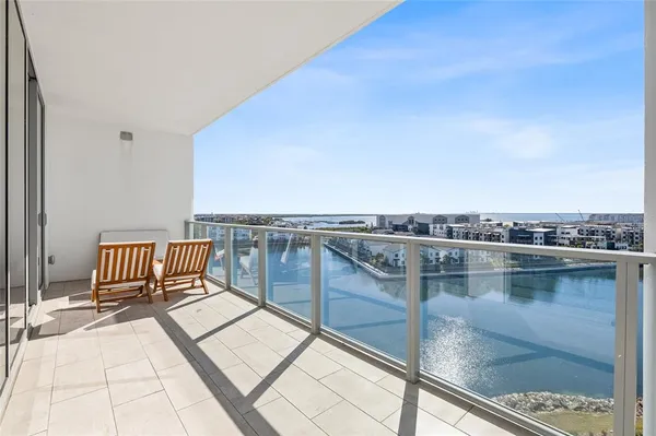 a balcony with a city view
