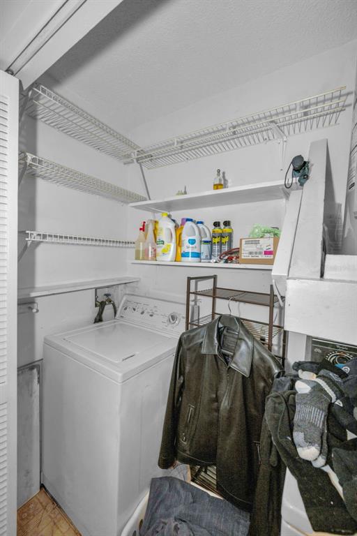 2407 Gun Flint Trail Palm Harbor, FL 34683 - Photo 12 of 43 a utility room with dryer and washer