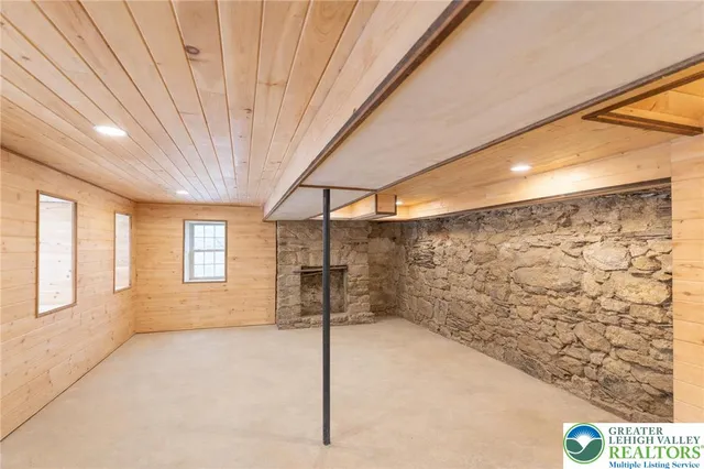 a view of a living room with a large window