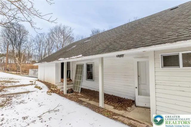 a view of a pathway with a street