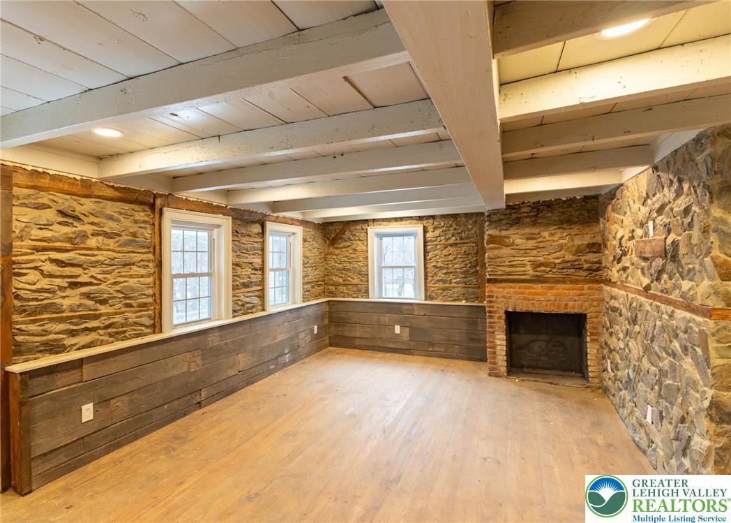 3401 Popular Drive Northampton, PA 18067 - Photo 2 of 21 a view of an empty room with a fireplace and a window