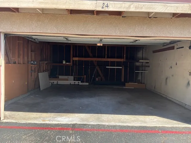 a view of a house with a street